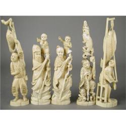 A pair of late 19th century oriental carved ivory Okimono's and three others, tallest 23.5cm Est....