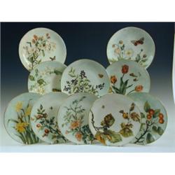 A set of ten Mintons plates, each painted with different flowers and insects, impressed marks for...