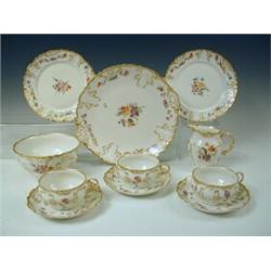 A Limoges twelve setting part tea service, (some damage) Est. 150/200...