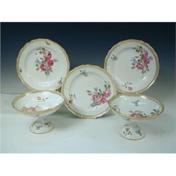 A Meissen part dessert service comprising two comports and six plates each painted with flowers w...