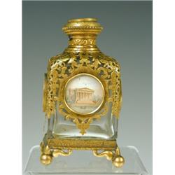 A French Palais Royale scent bottle with gilt metal mounts and circular architectural panels, 12c...