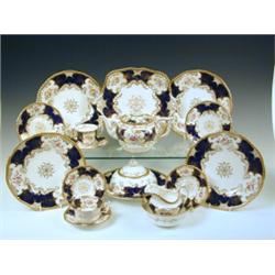 A large quantity of Coalport teawares, in the cobalt blue batwing design with gilt decoration and...
