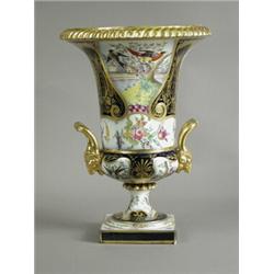 A Continental porcelain campana shaped urn, decorated with birds and gilt, 31cm high Est. 150/180...