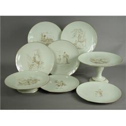 A Pinder Bourne & Co eight piece dessert set comprising two comports and six plates, each decorat...