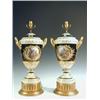 Image 1 : A pair of 19th century Berlin porcelain vases, each painted with pairs of circular panels of rust...