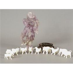 A collection of ten carved ivory figures of animals, each approx 2.5cm high together with a carve...