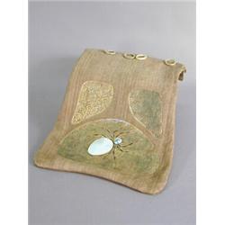 An Art Nouveau kid (?) leather purse, with embossed and gilt heightened spiderweb and leaf design...