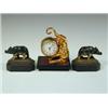 Image 1 : A late 19th century clock with an enamelled dial and French movement mounted on a gilded bronze e...