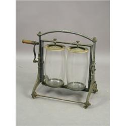 A cast iron patent butter churn, 'The Speedwell Crystal Churn No. 2 Dairy Supply Co. Ltd., London...