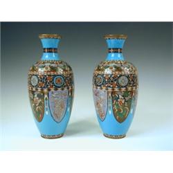 A pair of early 20th century cloisonnT baluster vases with panels decorated with exotic birds, 31...