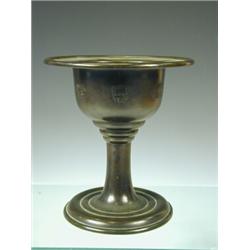 A late 19th century Chinese bronze censer with character marks over the body and raised on a high...