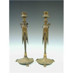 A pair of Neo-Classical style bronze and gilt caryatid candlesticks, (missing arms), 32cm high Es...