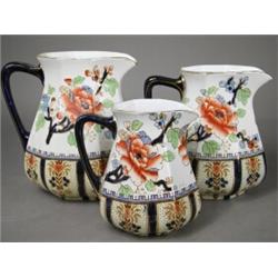A graduated set of three Losol ware jugs, pattern 3467, printed marks to underside Est. 150/200...
