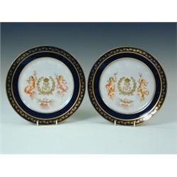 A pair of mid 19th century Sevres style porcelain plates, with a blue printed circular mark, date...