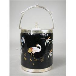 A 19th century black opaline glass biscuit barrel with silver plated mounts, decorated in enamels...
