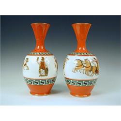 A pair of 19th century French porcelain vases with Etruscan scene decoration, framed by Greek key...