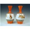Image 1 : A pair of 19th century French porcelain vases with Etruscan scene decoration, framed by Greek key...