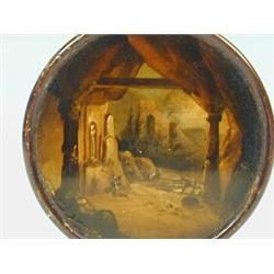 A 19th century papier mache patch box simulating burr wood, the lid decorated with a classical co...