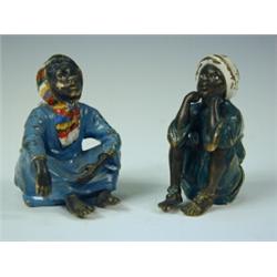 A pair of 19th century Bergman cold painted bronzes, modelled as two North African boys, cast mar...