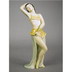 An early 20th century Wade Art Deco figurine entitled 'Lotus', 24cm high (some paint flaking and...