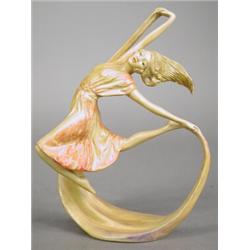 An early 20th century Wade Art Deco figurine entitled 'Dawn', 19.5cm high, printed marks (some sm...