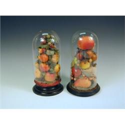 Two Victorian wax fruit displays, under glass domes, 33cm high Est. 150/200...