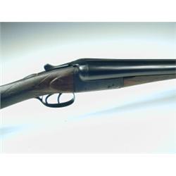 A Holland and Holland 12 bore box lock double barrel shotgun serial No. 91662 nitro proof, 30" ba...