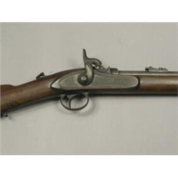 A mid 19th century percussion gun, inscribed Westley Richards & Co, 1863, with an unusual breech...