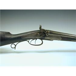A Purdey 20 bore double barrel hammer gun, the action engraved with stags within a landscape (sto...