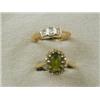 Image 1 : Two rings: an 18ct gold peridot and diamond cluster, size P, and an 18ct and platinum three stone...