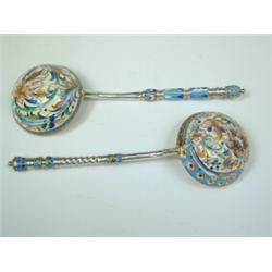 A similar cloisonnT enamel spoon, the bowl decorated with flowers and banded, with a gilt interio...