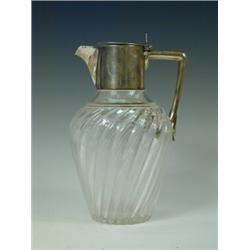 A Victorian mounted claret jug, Sheffield 1889, 20cm high Est. 200/300...