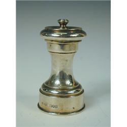 A late 19th century silver pepper mill, London 1898, maker 'J.G and S', 8.5cm high Est. 130/180...