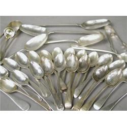An assortment of Georgian, Victorian and later spoons and sugar tongs, comprising two George III...