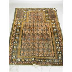A Persian rug with a brown and gold ground, 165 x 100cm Est. 80/120...