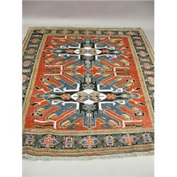 A modern red ground handmade woollen Chechen rug, 1.84 x 1.75m Est. 250/350...
