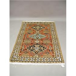 A modern rose ground handmade silk Persian Ardebil rug, 1.60 x 1.13m Est. 250/350...