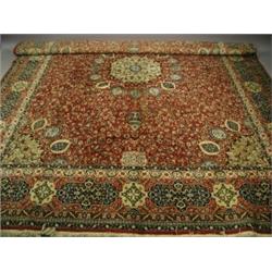 A Tabriz carpet, 2nd half 20th century with a central medallion, on a red ground, 2.73 x 3.64m Es...