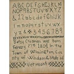 An early 19th century sampler 'Betsy Crosman was born February 27th 1804 in the town of Wilmingto...
