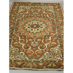A Persian rug, with a triple border and central rendiating medallion, 210 x 143cm (6'6 x 4'6ft) E...