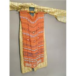 A silk embroidered and braided coat, a 1920's beaded dress and a tassel Est. 60/80...