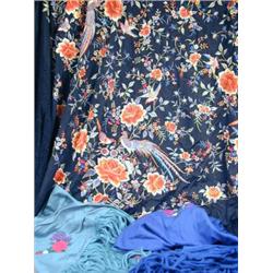 Three shawls, one with embroidered floral bird and insect design, with tasselled edging, and two...