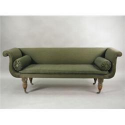 A Regency period scroll end settee, the grained beechwood front legs carved with shells and gadro...