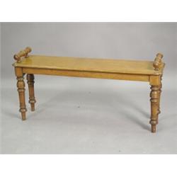 A Victorian light oak window seat, on turned legs, 107cm wide Est. 200/300...