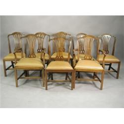 A set of eight mahogany dining chairs, circa 1920, with vertically pierced splat backs and drop i...