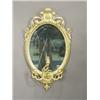 Image 1 : A pair of mid 19th century oval girandoles, with surmounted foliage, each with three sconces, (re...