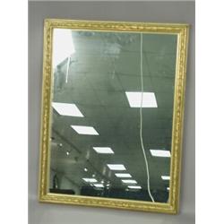 A mid 19th century gilt wall mirror, with trade label to reverse J & W Vokins, looking glass and...