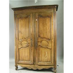 An early 19th century Armoire with inlaid floral star motifs, 200 x 130cm Est. 400/600...