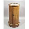 Image 1 : A Victorian mahogany circular pot cupboard, with a marble top, on a plinth base, 72cm high Est. 2...