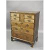 Image 1 : An 18th century walnut chest of four small drawers with a central cupboard, over three long drawe...